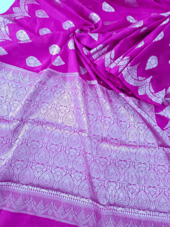 Soft Magenta Handloom Silk Saree with Silver Zari & Floral Motif (Mane Made Silk)