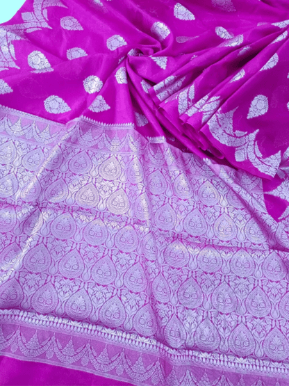 Soft Magenta Handloom Silk Saree with Silver Zari & Floral Motif (Mane Made Silk)