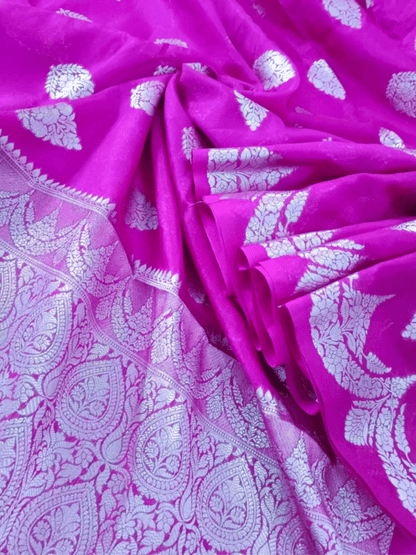 Soft Magenta Handloom Silk Saree with Silver Zari & Floral Motif (Mane Made Silk)
