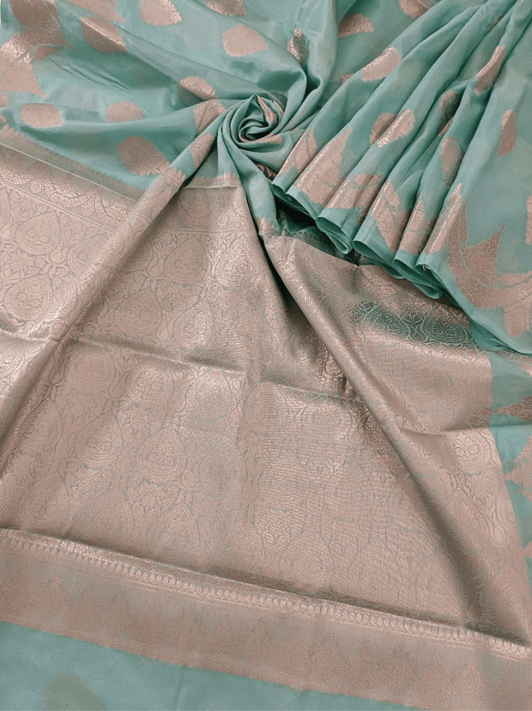 Soft Sea Green Handloom Silk Saree with Silver Zari & Floral Motif (Mane Made Silk)
