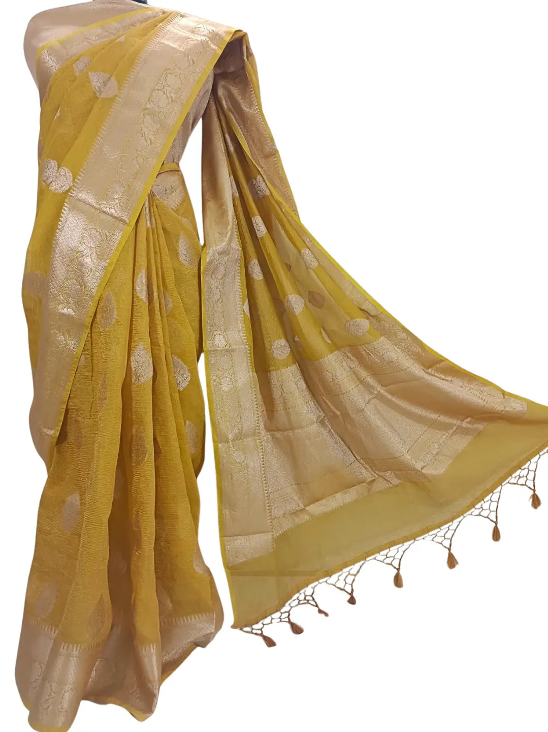 Step into timeless elegance with this stunning Mustard Banarasi Silk Saree