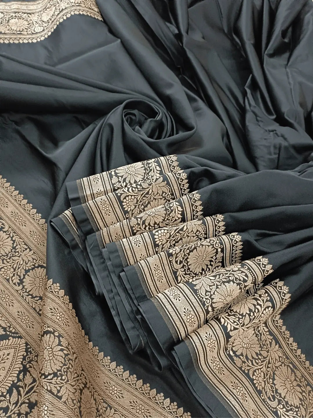 Exquisite Black Handloom Soft Mashru Silk Saree With Gold Zari Border & Aancha